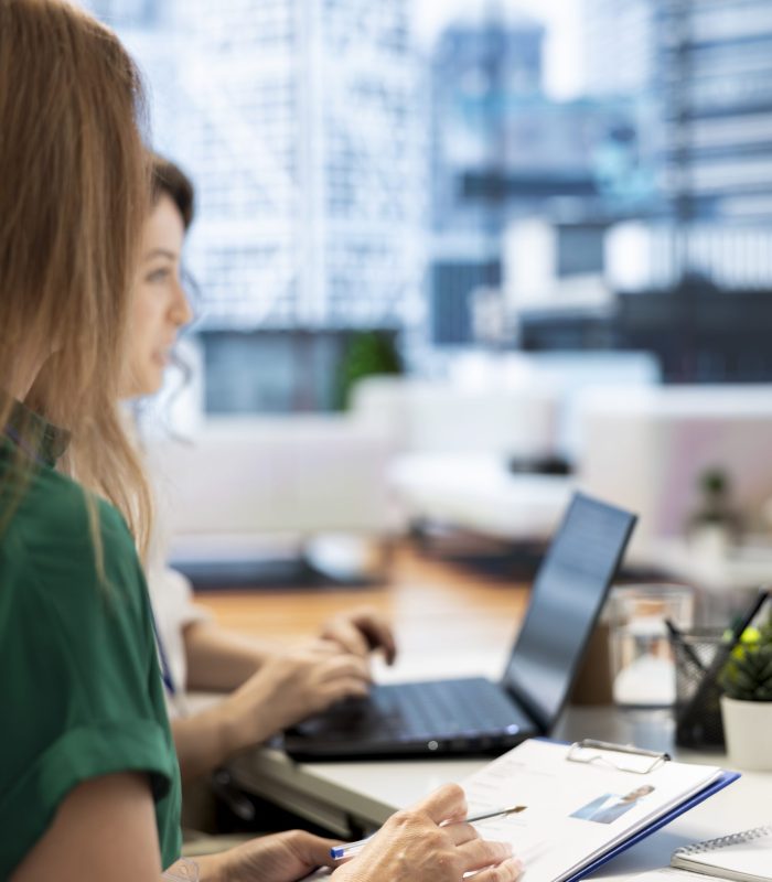 HR colleagues doing screening, determining if candidate is qualified and possesses skills and experience needed to fulfil the role. Recruiters evaluate if applicant qualifications align with company